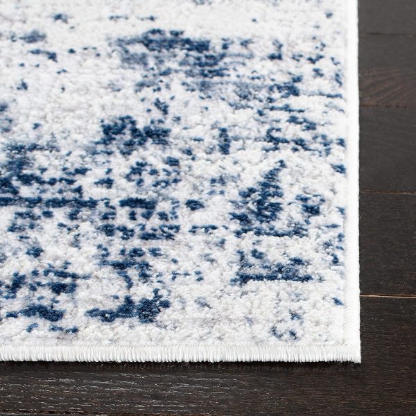 SAFAVIEH Amelia Collection Area Rug - 8' x 10', Ivory & Navy, Modern Abstract Design, Non-Shedding & Easy Care, Ideal for High Traffic Areas in Living Room, Bedroom (ALA700B) - Image 4