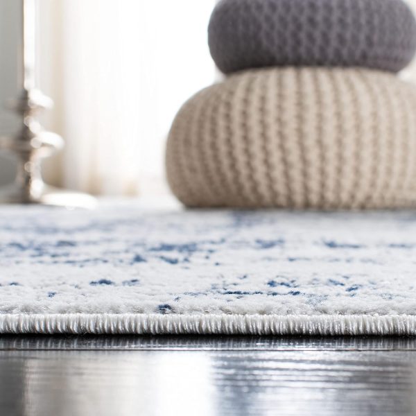SAFAVIEH Amelia Collection Area Rug - 8' x 10', Ivory & Navy, Modern Abstract Design, Non-Shedding & Easy Care, Ideal for High Traffic Areas in Living Room, Bedroom (ALA700B) - Image 5